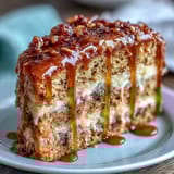 Golden cake infused with dandelion honey and lemon zest, finished with a glossy citrus glaze for a fragrant treat.