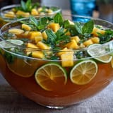 Tropical Grad Party Punch: Mango Pineapple sparkling lemonade refreshment.