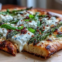 Roasted Asparagus Flatbread with creamy burrata and bright lemon zest.